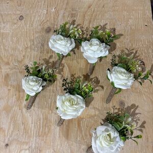 Elegant White Rose Boutonnieres
